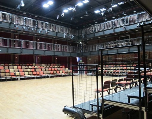 The Black-E Main Space, with audience seating in place for an event.